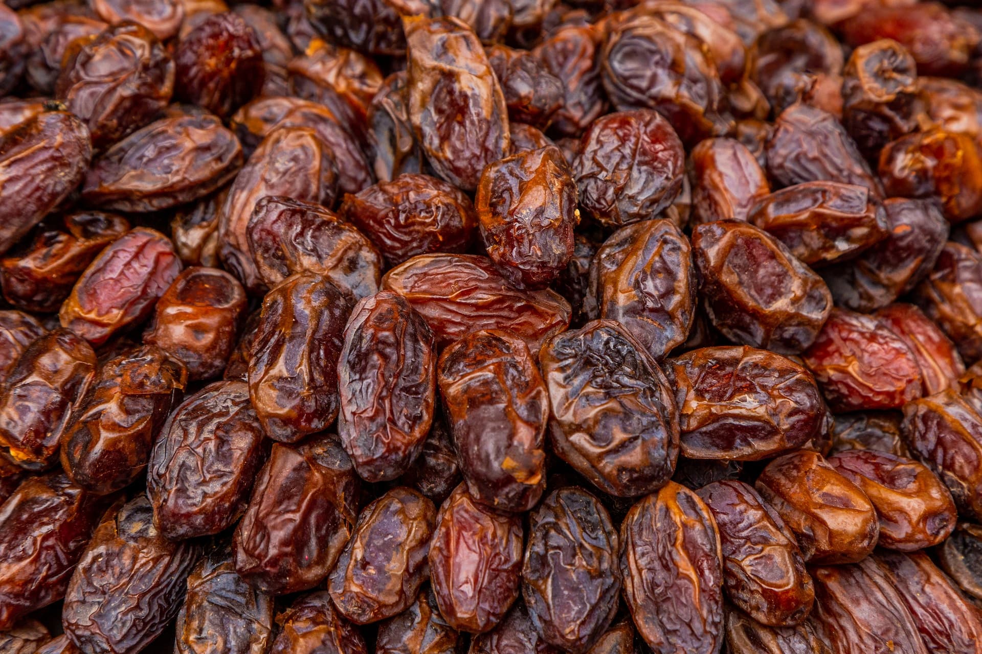 shallow focus photography of almonds in white ceramic bowl