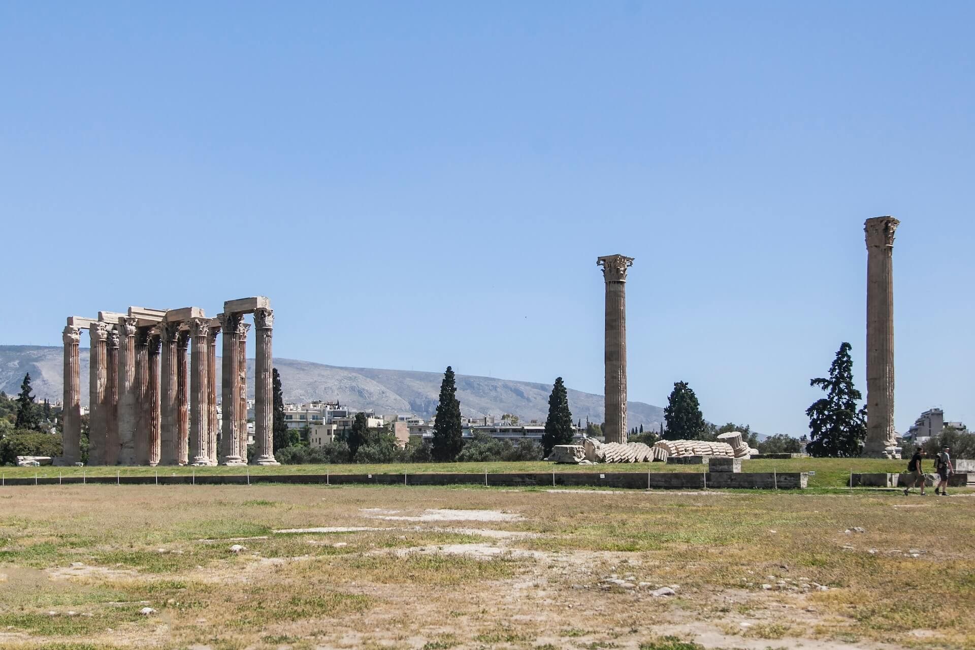 a tall pillar with a statue on top of it