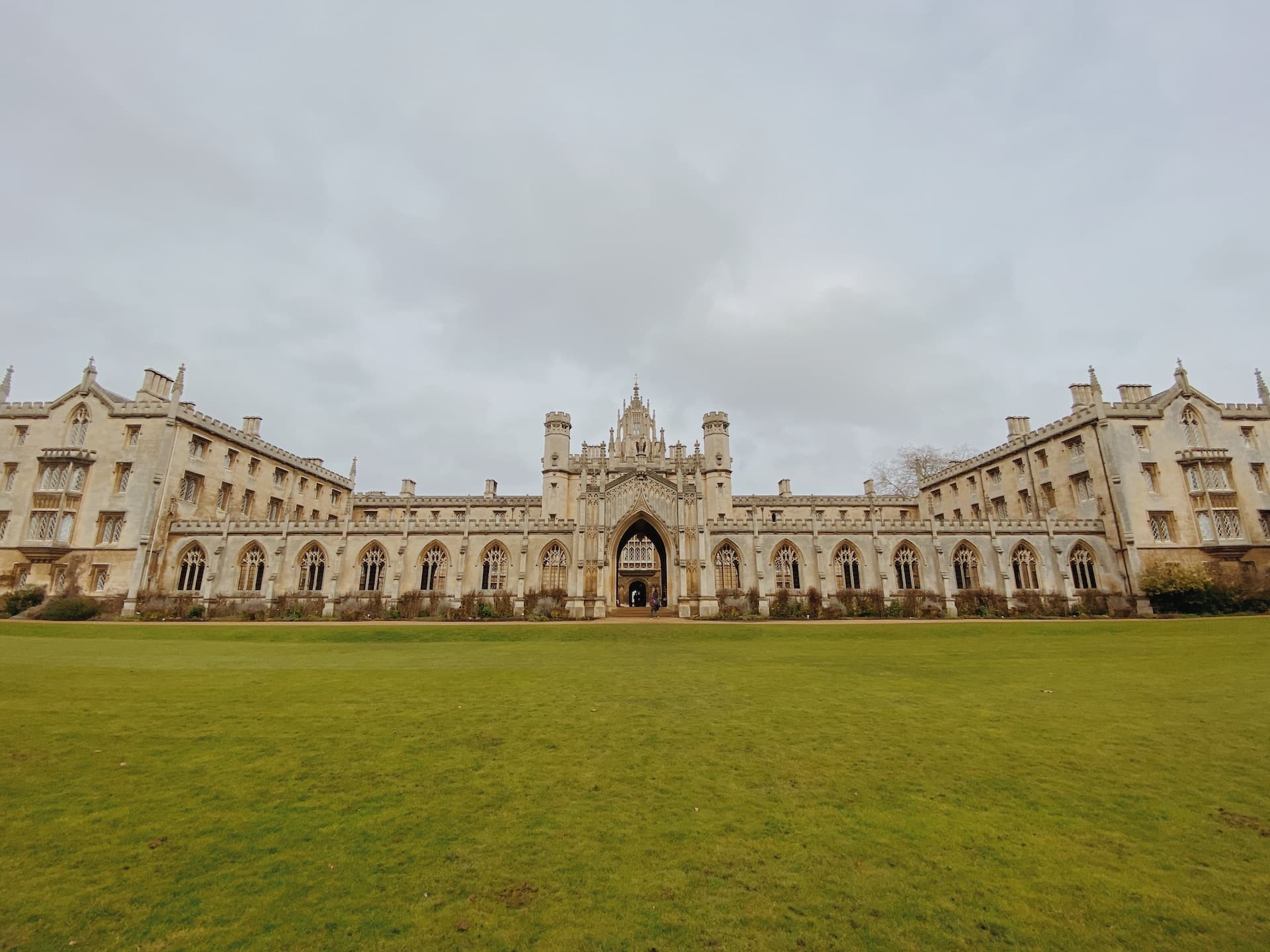 brown building and green grass