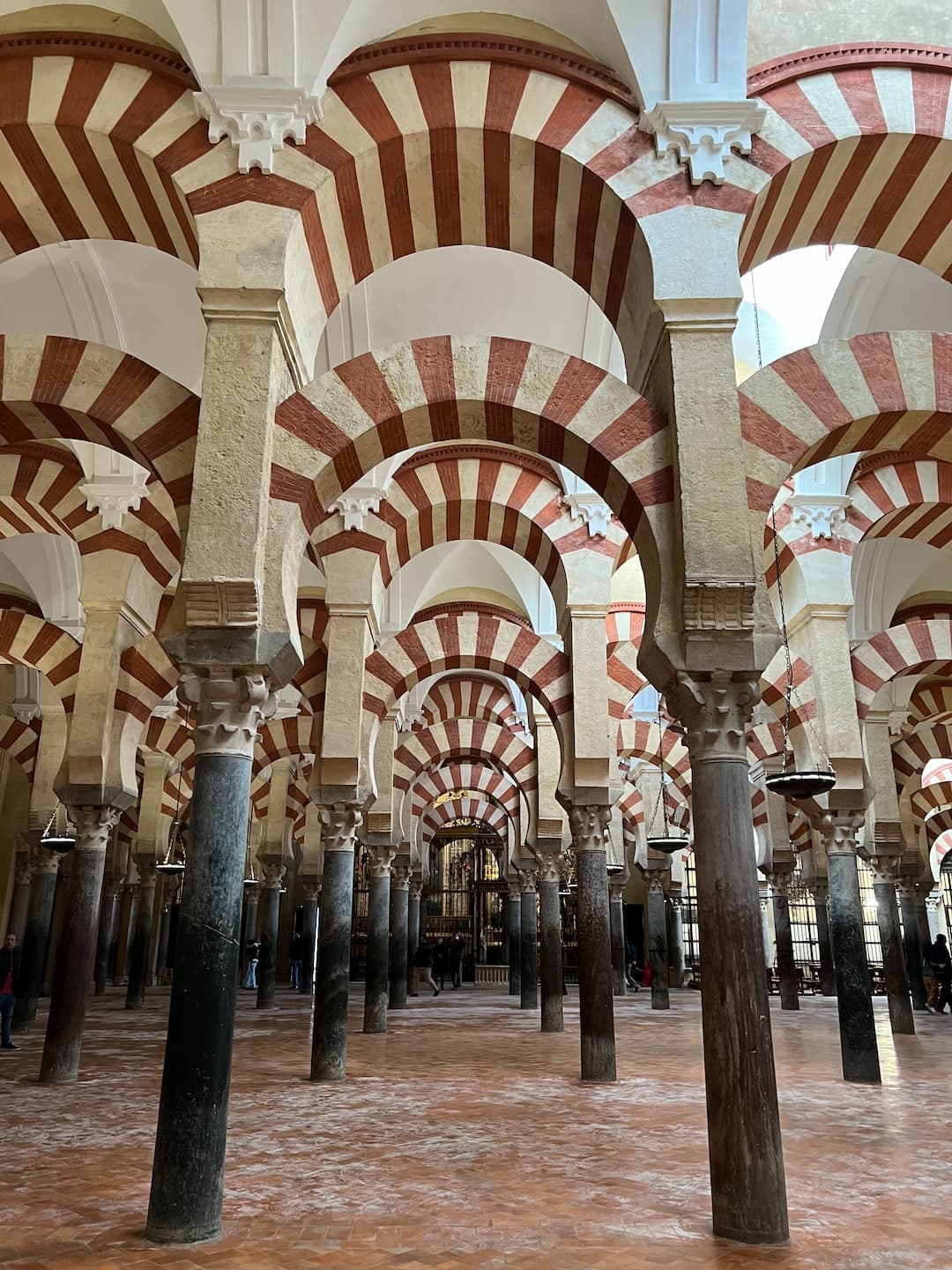 a group of pillars in a large building