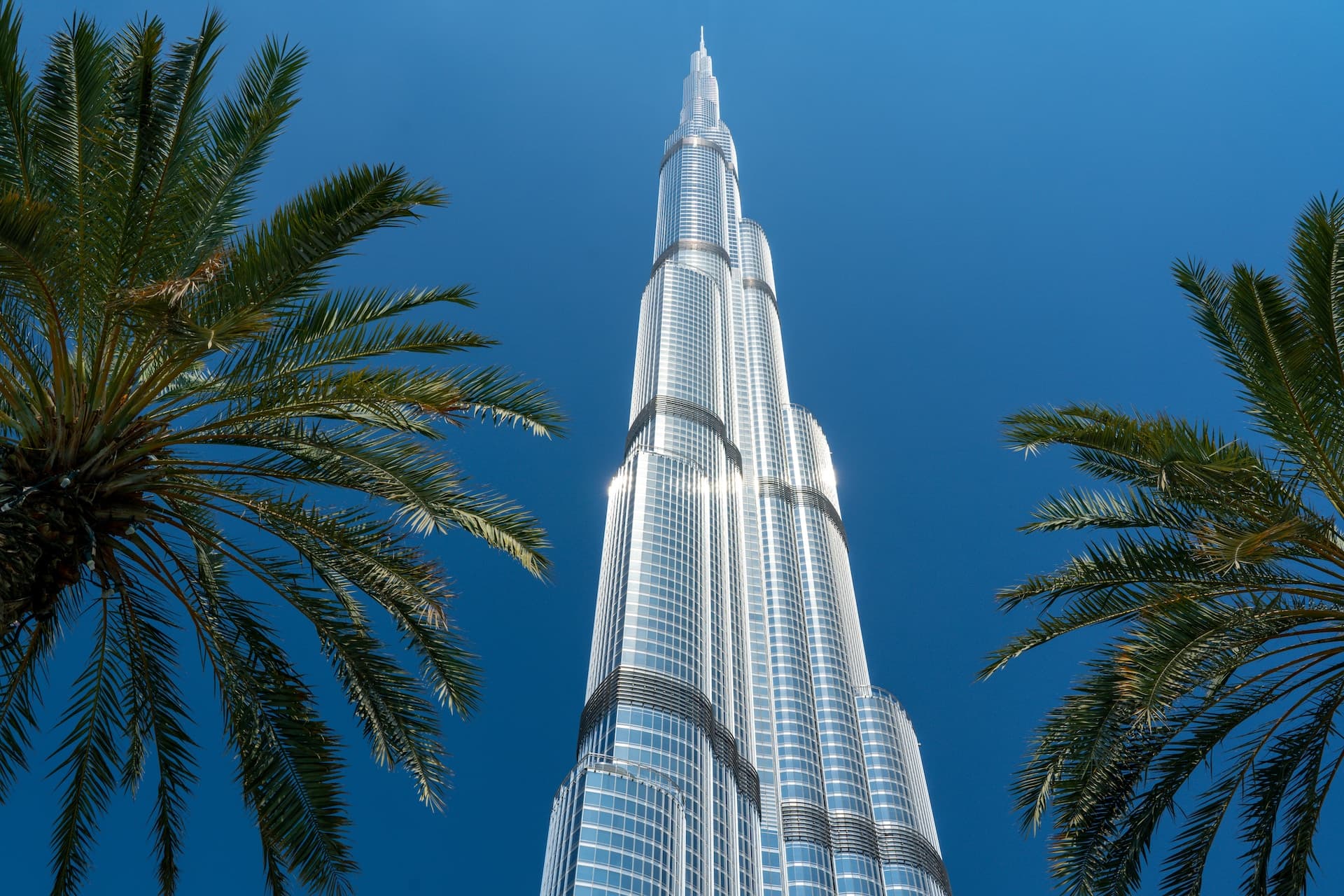 a very tall building with a sky background