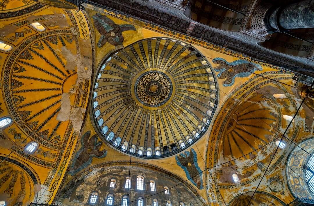 a domed ceiling with many paintings