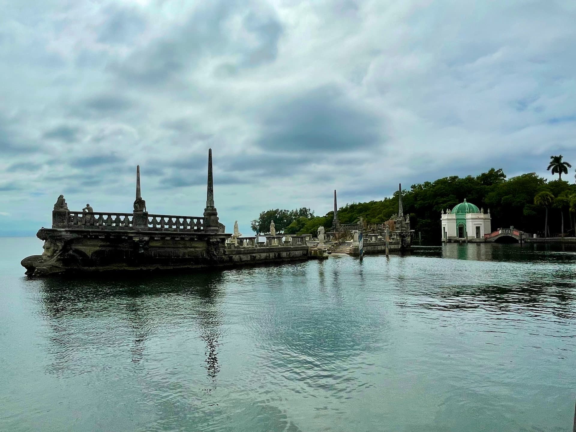 a large body of water with a bridge in the middle