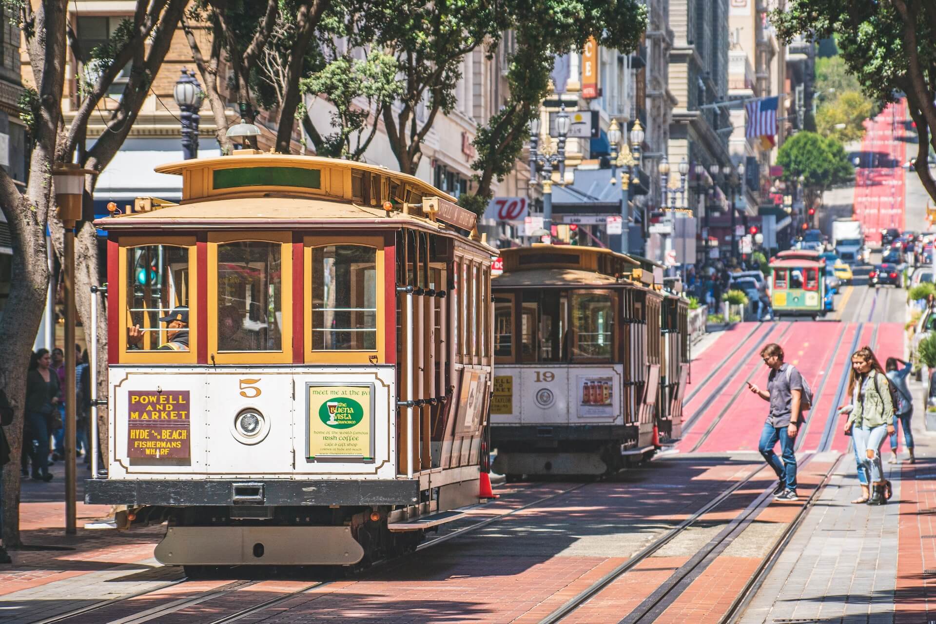 grey cable car between buildings