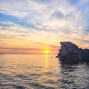 COUCHER DE SOLEIL : visite en bateau de sites classés et baignade.
