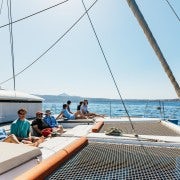 Santorini: Luxury Catamaran Day Trip with Meal and Open Bar